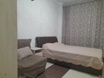 Трехместный номер с балконом в Малютка