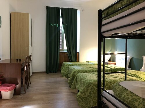 Номер, общий смешанный номер в Freedom Traveller Hostel