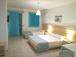 Улучшенный трехместный номер, вид на сад в Marilisa Hotel