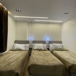 Четырехместный номер «Делюкс» в White Pyramids inn