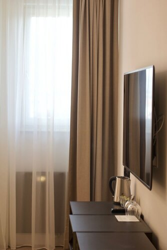Стандартный трехместный номер в Chevron Design Hotel Prague