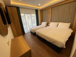 Стандартный трехместный номер в Pege Hotel