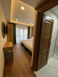 Стандартный четырехместный номер в Pege Hotel