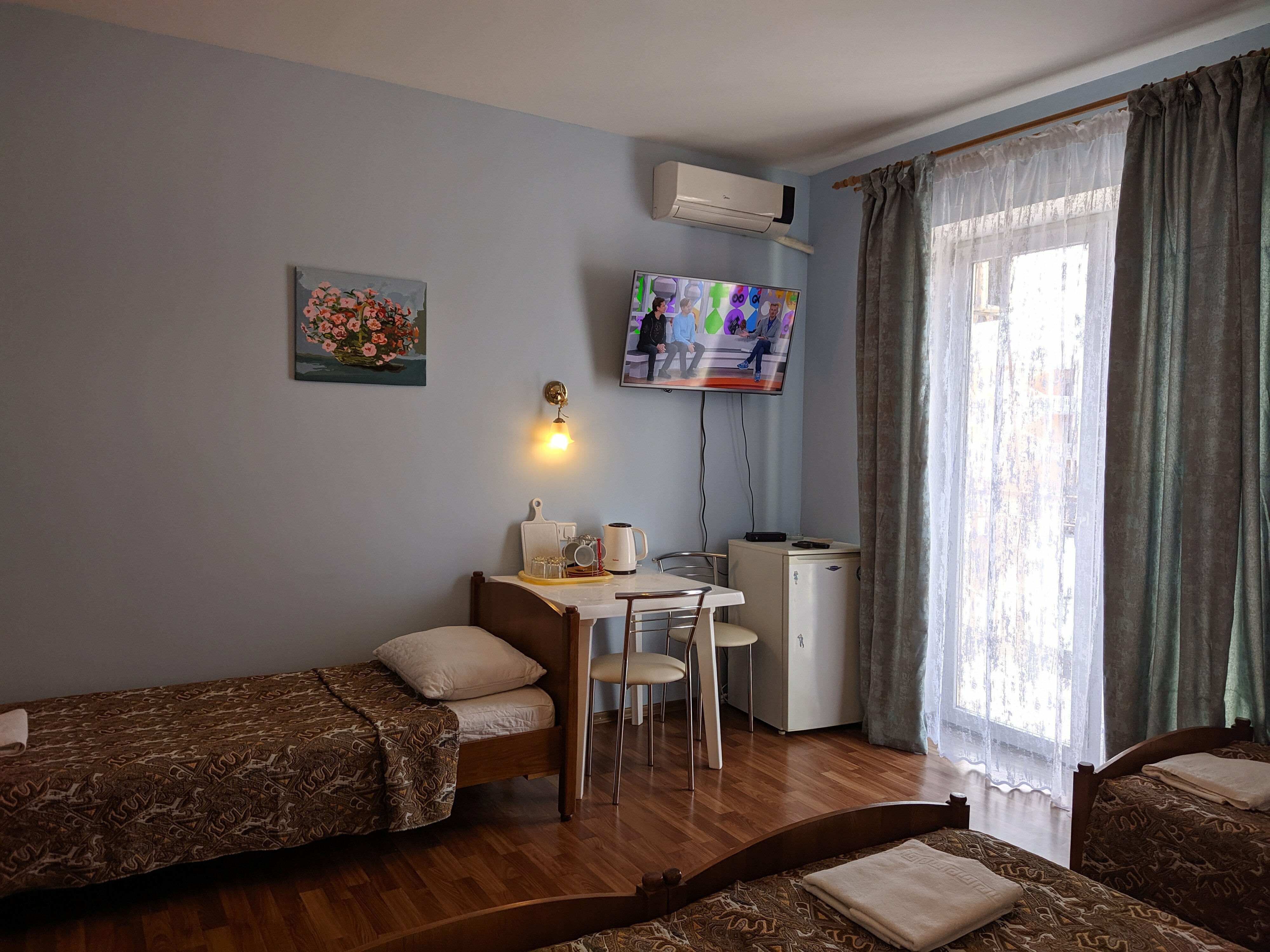 Трехместный номер с балконом