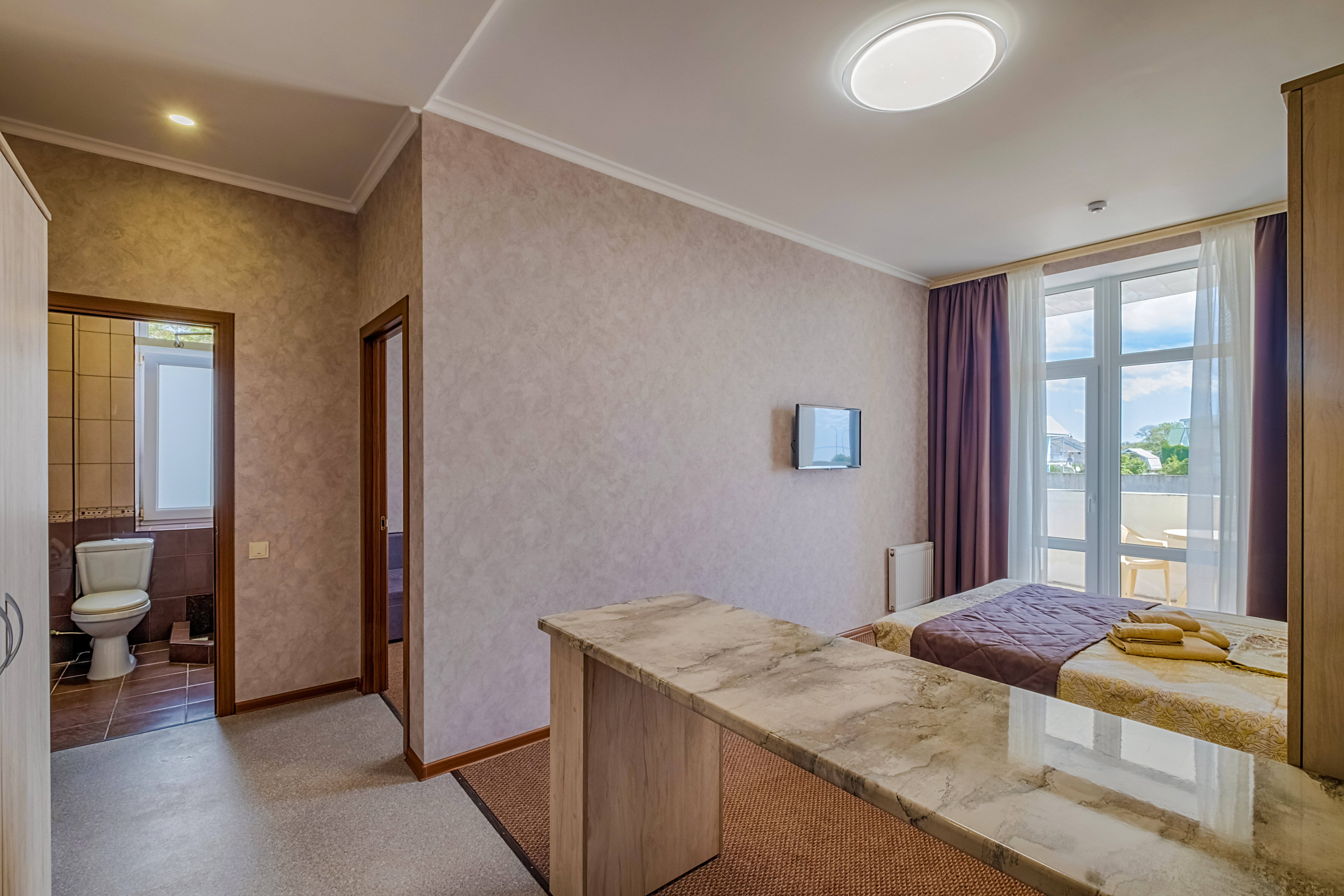 Четырехместный номер с балконом