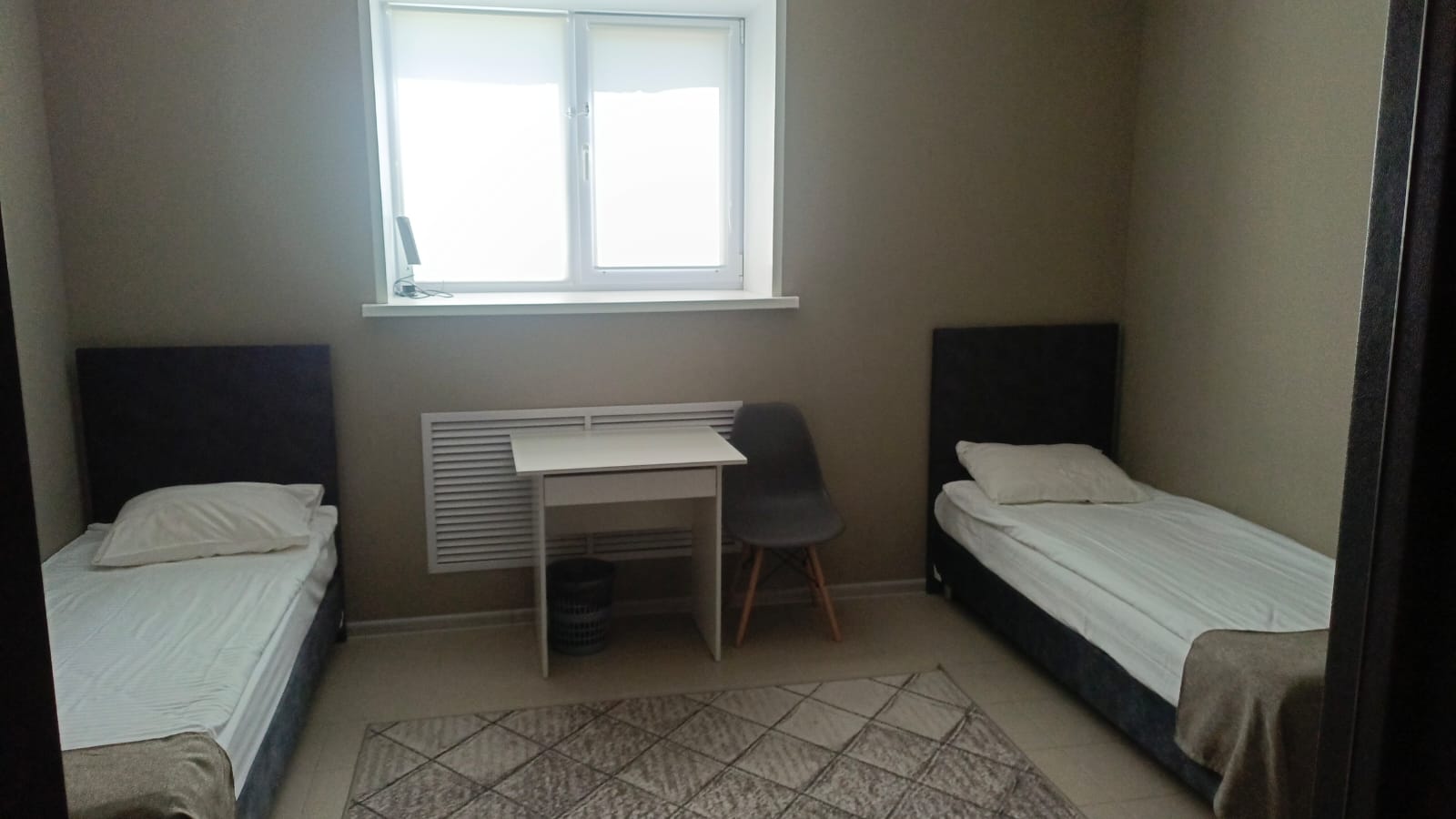 Односпальная кровать в двухместном номере