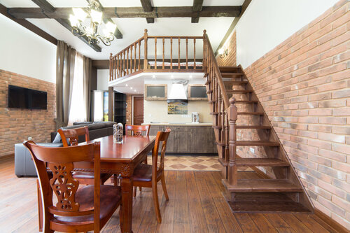 Двухуровневые апартаменты в Апартаменты 12