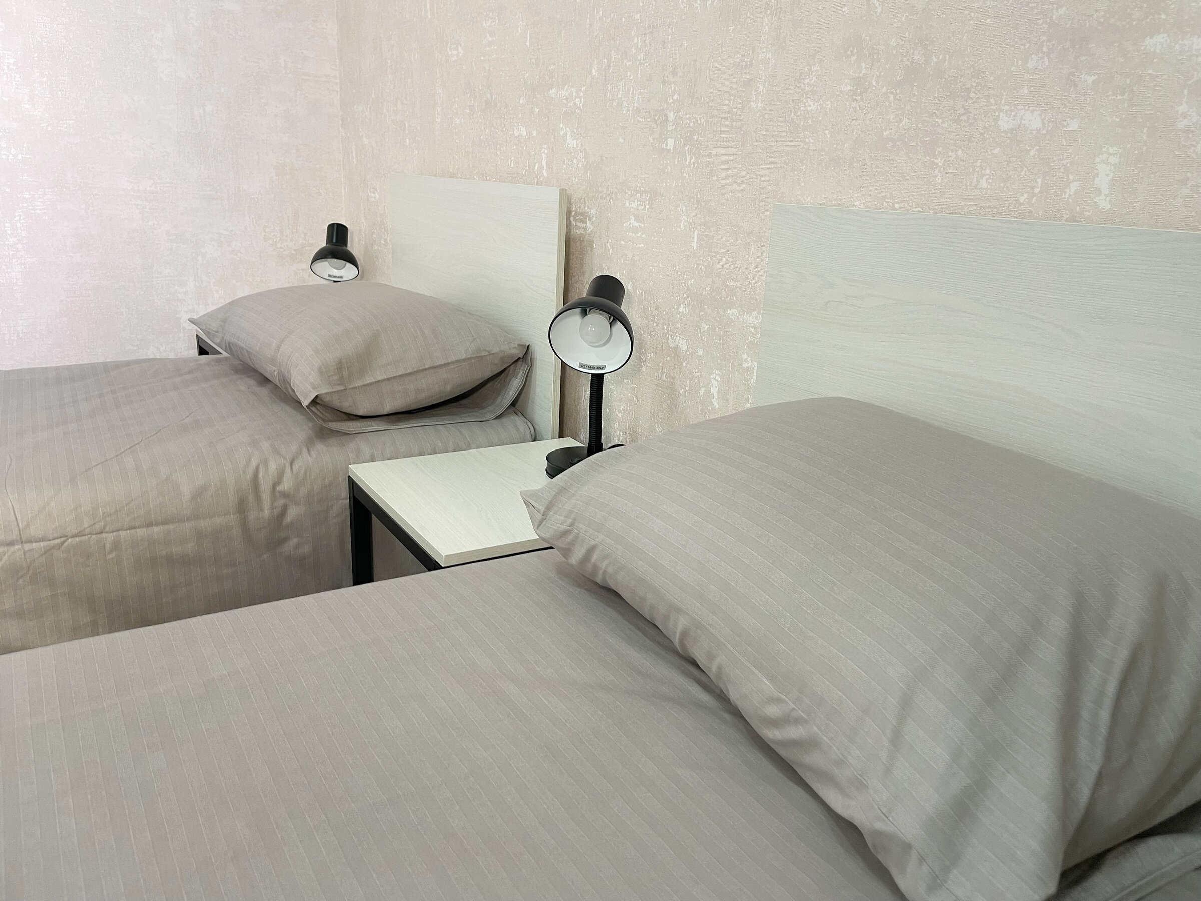 Двухместный номер с 2 отдельными кроватями и душем