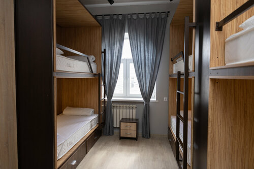 Кровать в общем 6-местном номере для мужчин и женщин