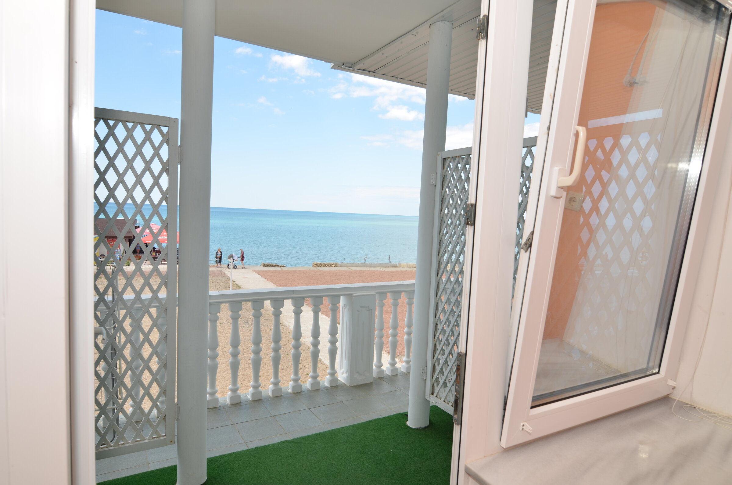 Двухместный  Премиум DBL, с кроватью "queen size" и отличным видом на море