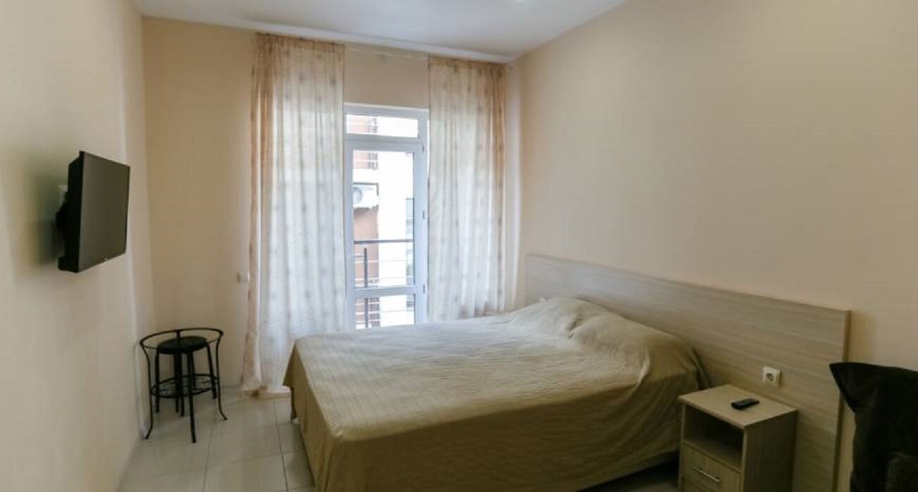 Трехместный номер с балконом