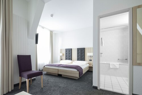 Улучшенный двухместный номер с 1 или 2 кроватями в Hotel Lötschberg