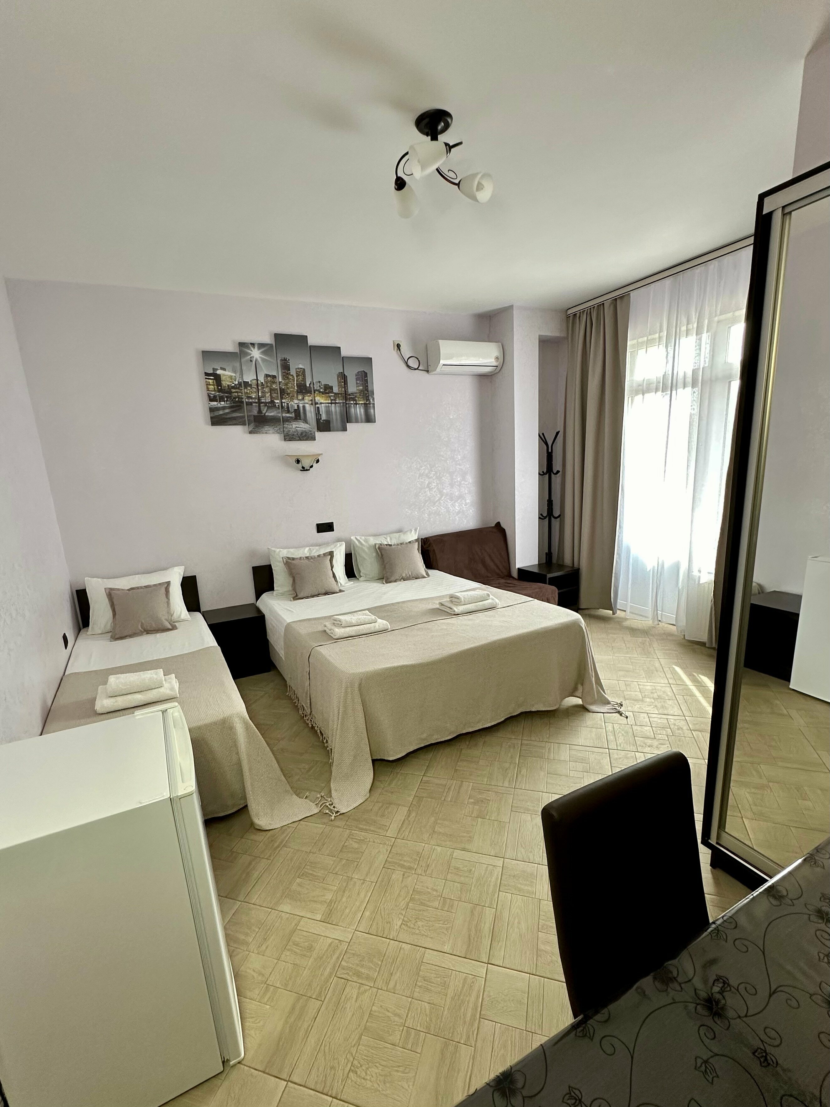 Улучшенный трехместный номер