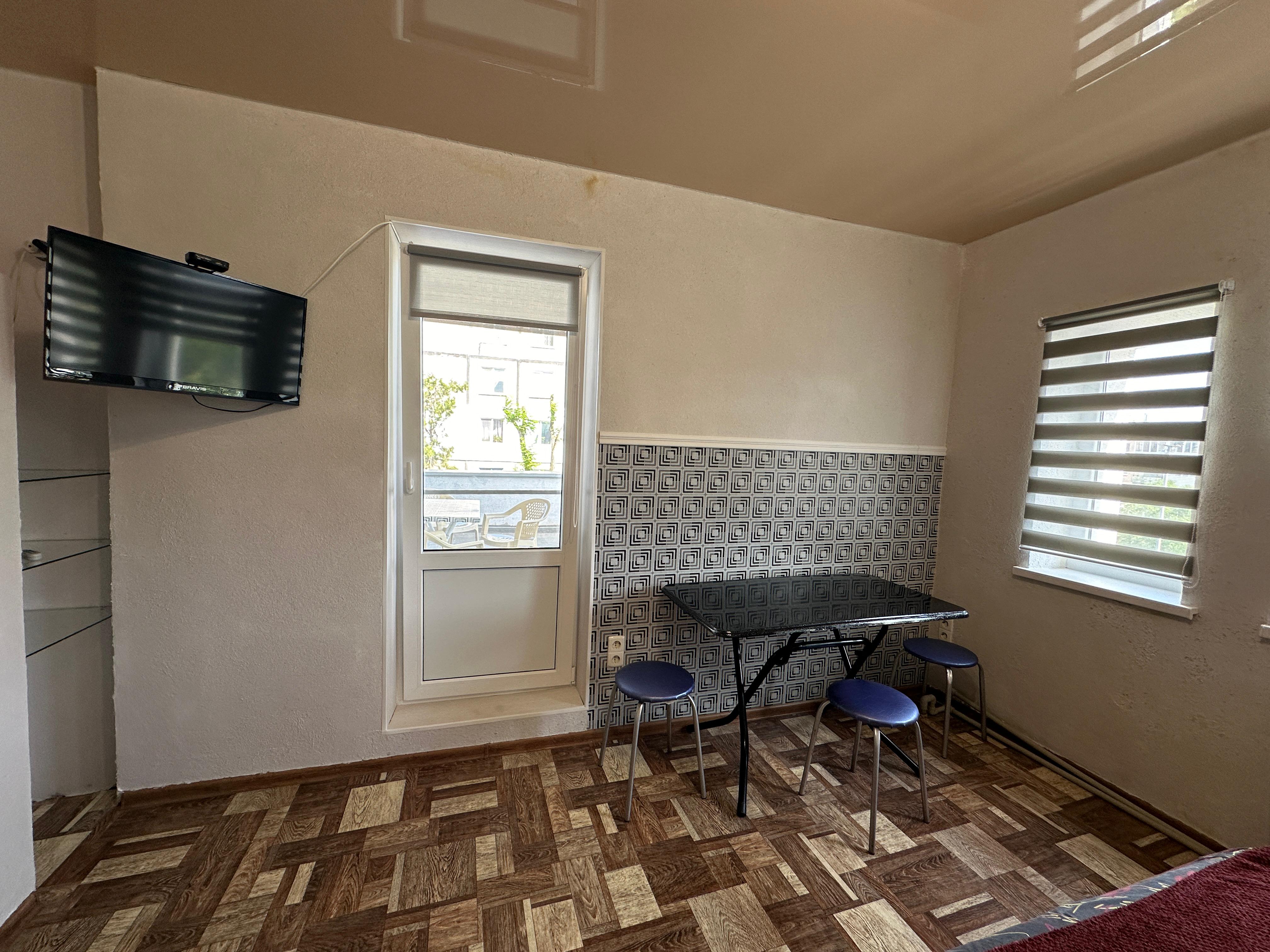 Трехместный номер с балконом