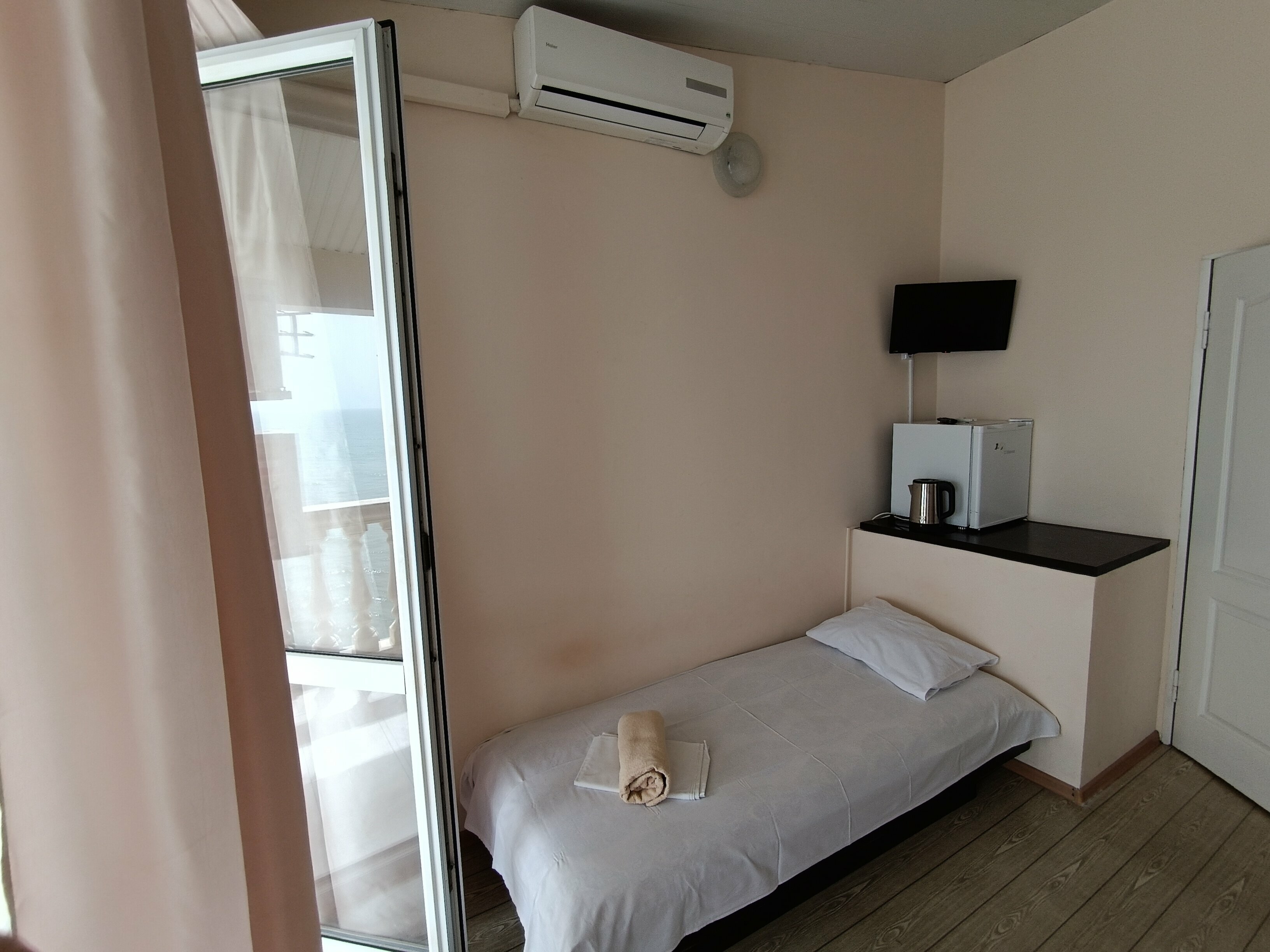 Трехместный номер с балконом