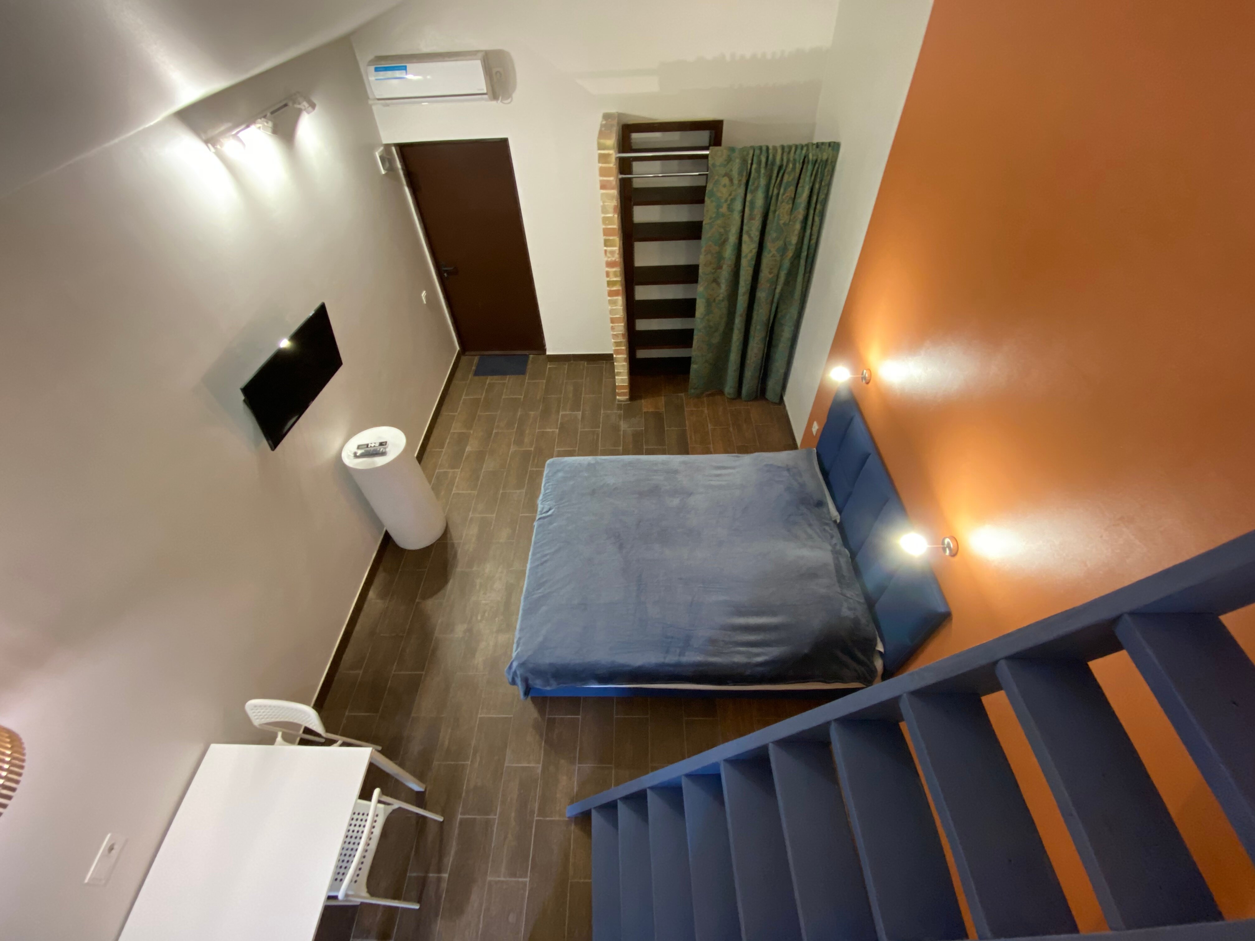 Двухуровневый номер-студия