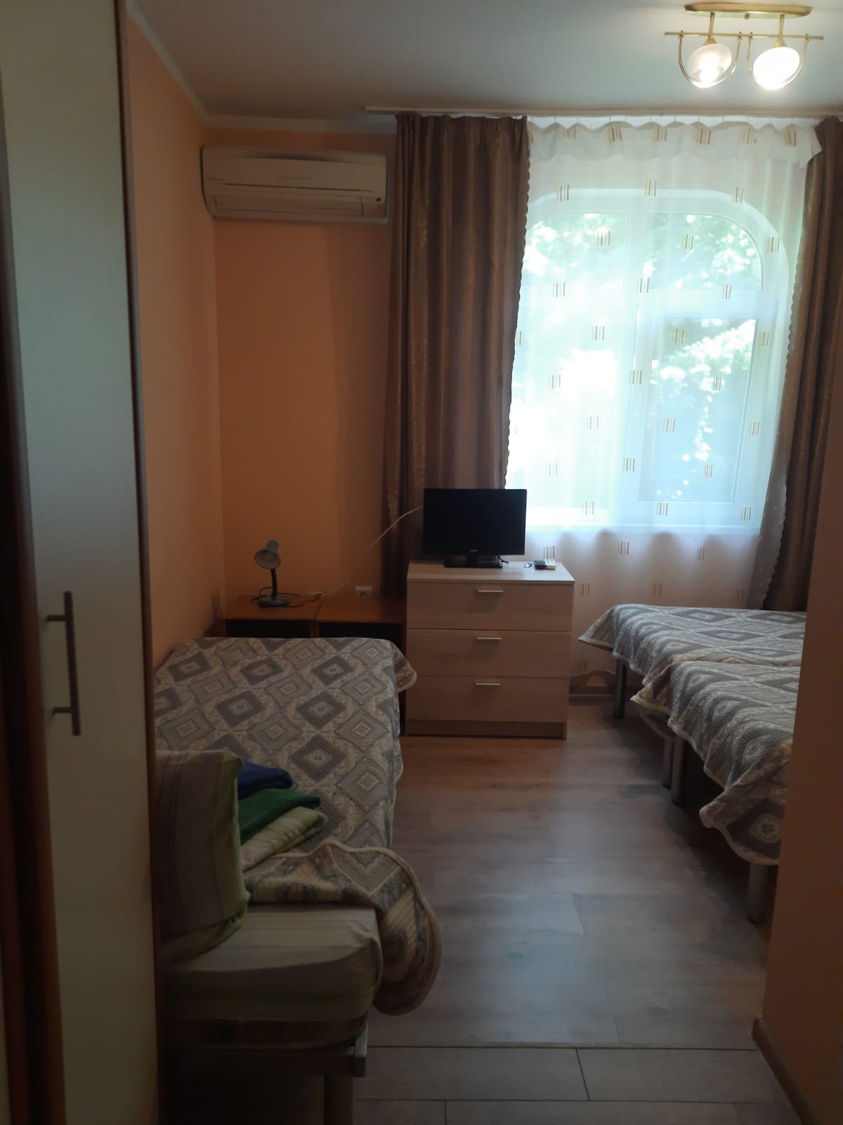 Стандартный двухместный номер с 2 отдельными кроватями, вид на сад