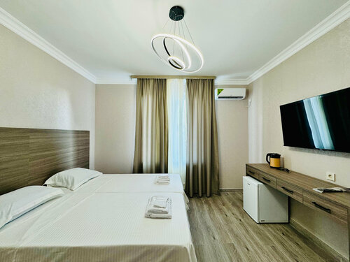 Улучшенный номер с кроватью размера «king-size» или 2 отдельными кроватями