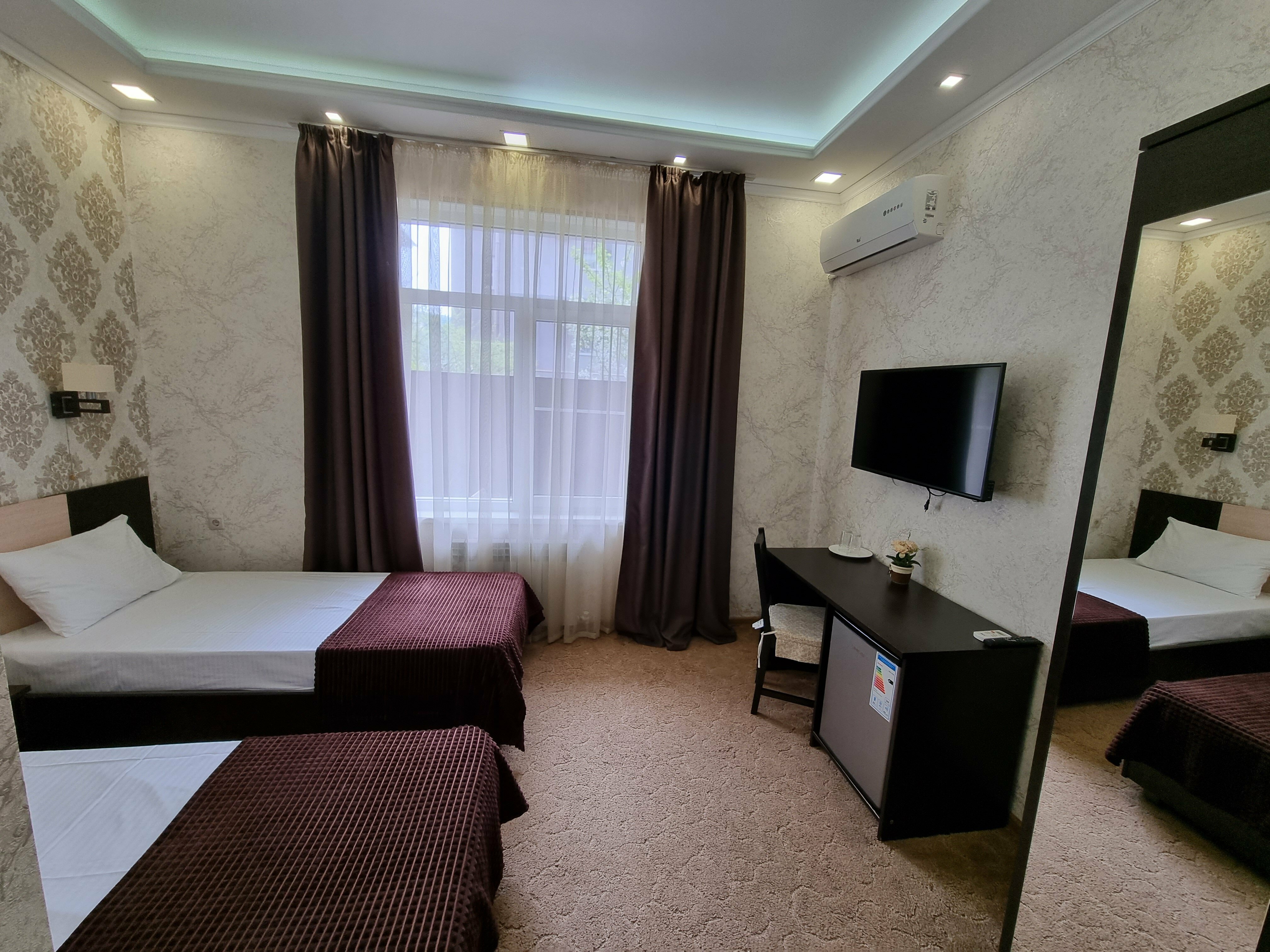 Двухместный номер с 2 отдельными кроватями и душем