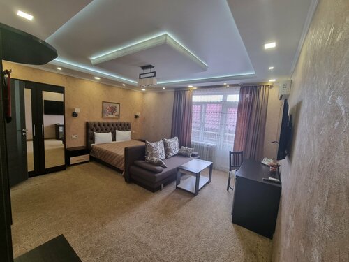 Люкс с кроватью размера «king-size» и балконом