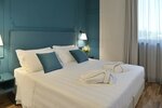 Двухместный номер «Делюкс» с 1 двуспальной кроватью в Hotel Torresi