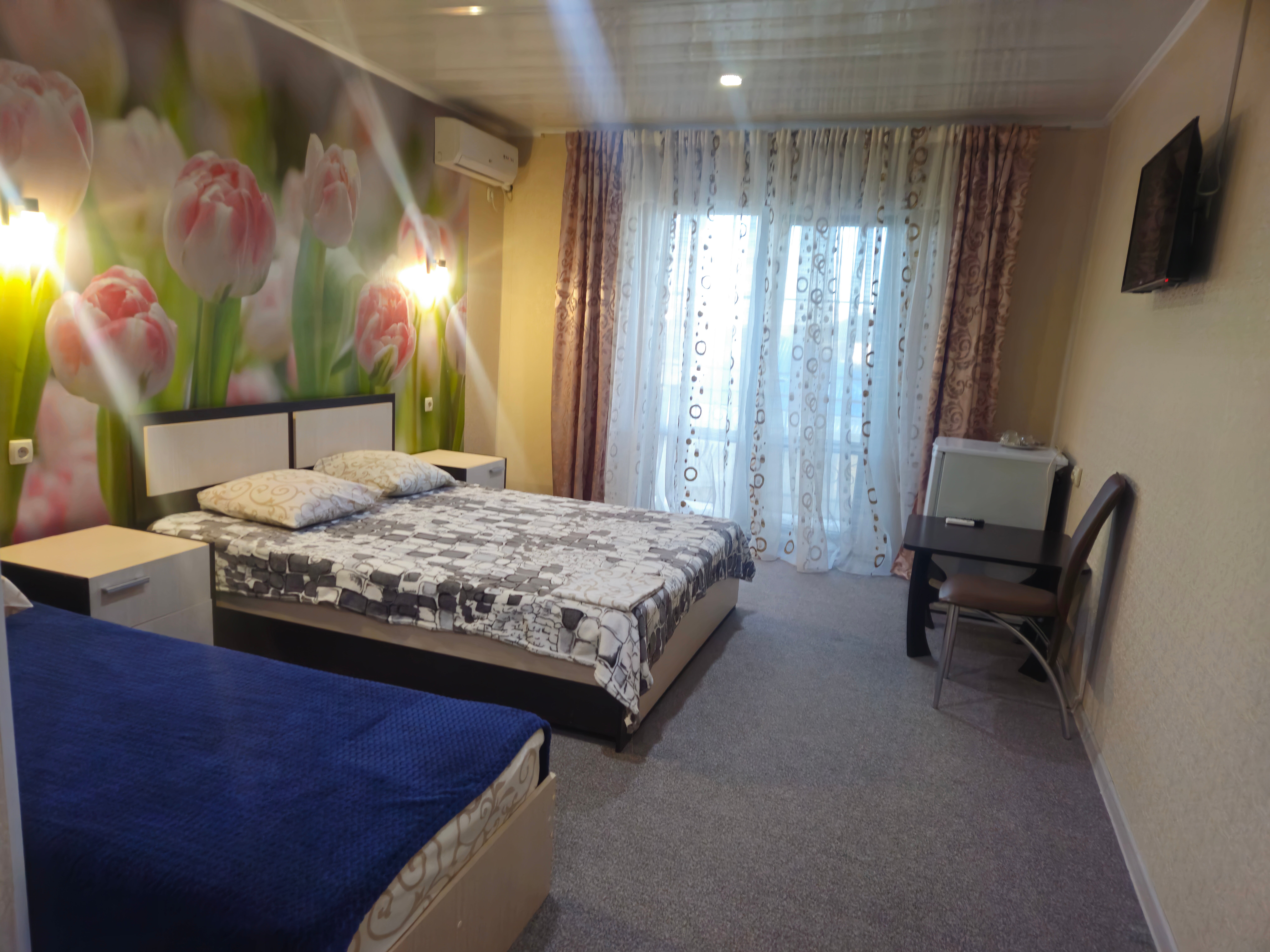 Трехместный номер с балконом