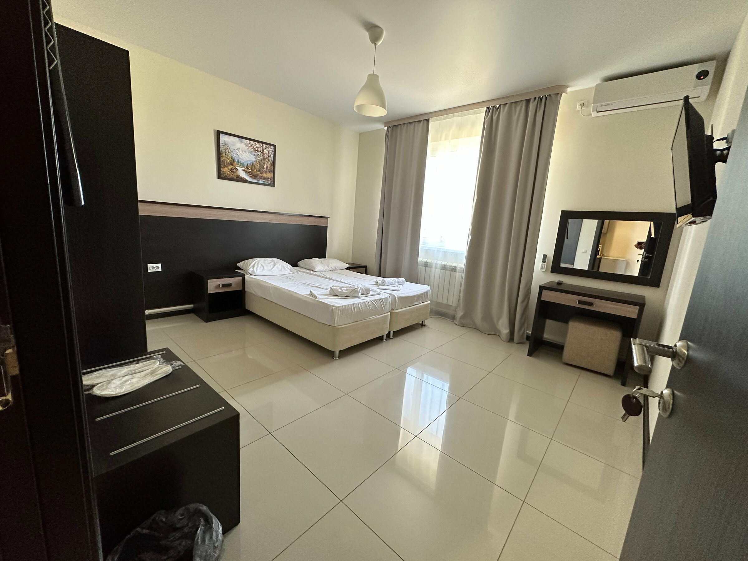 Четырехместный номер Делюкс