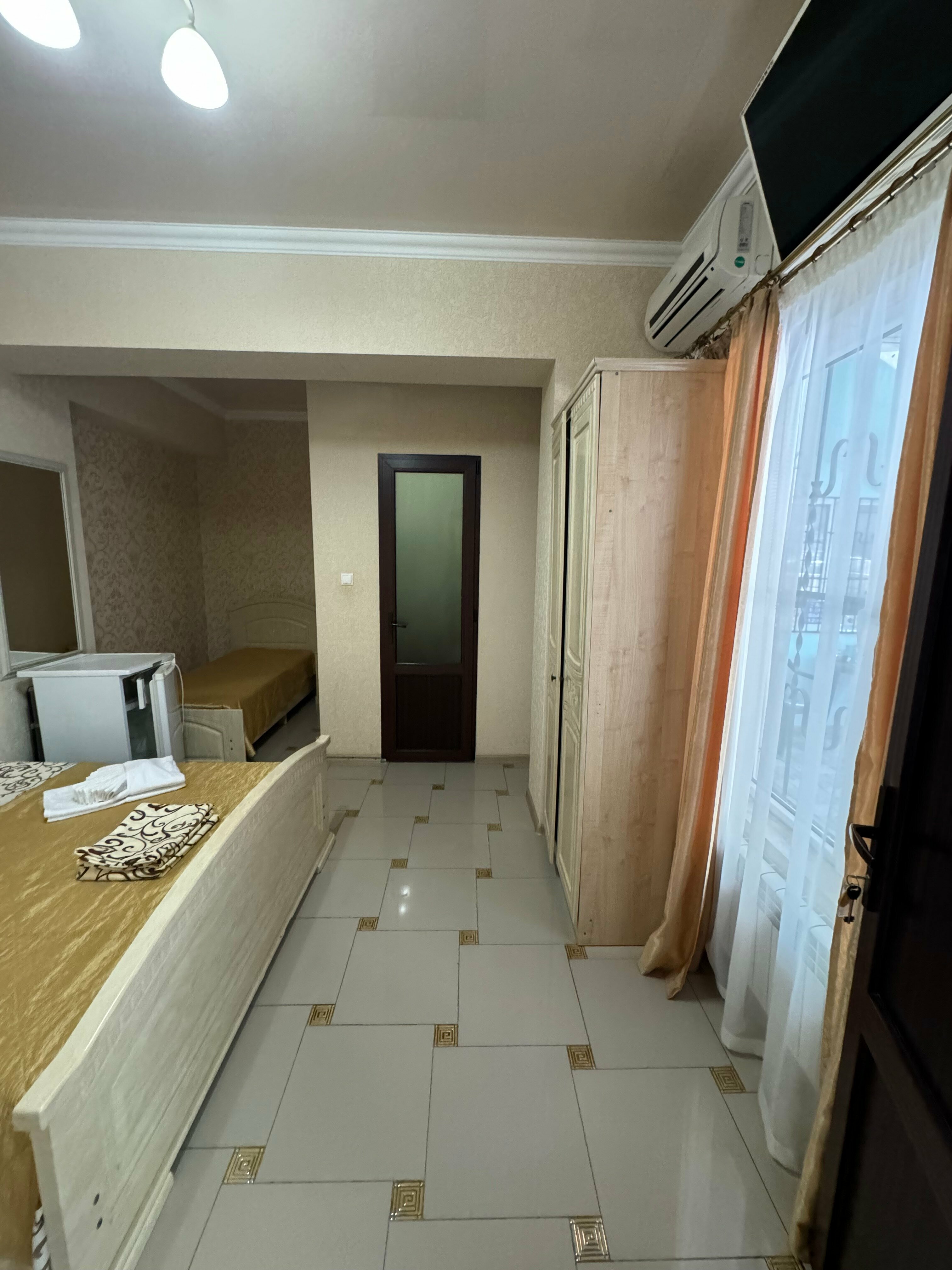 Трехместный номер Делюкс