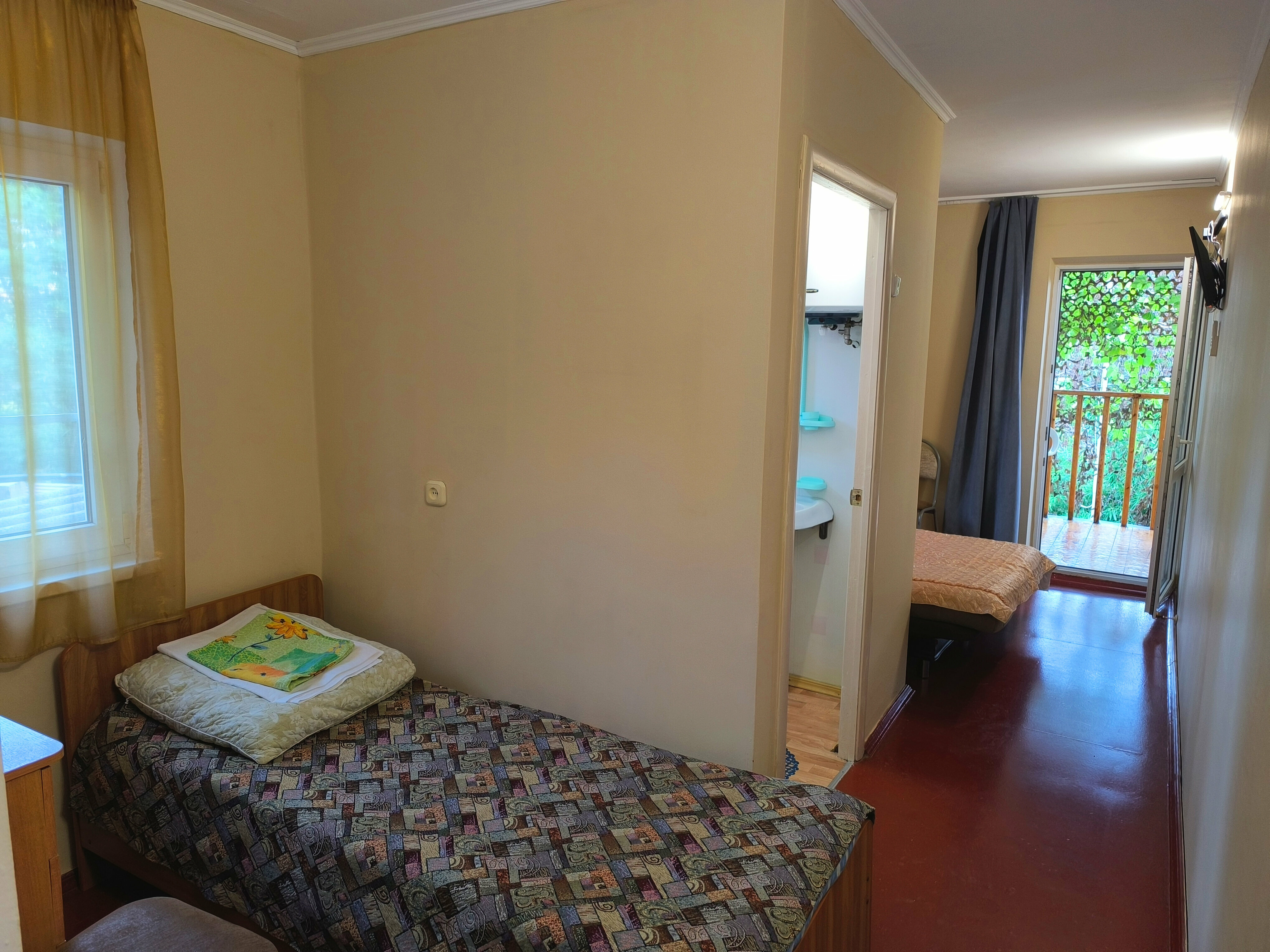 Трехместный номер с балконом