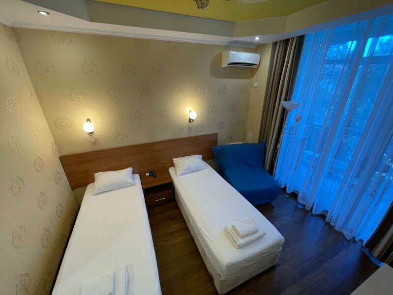 Двухместный номер с 2 двуспальными кроватями