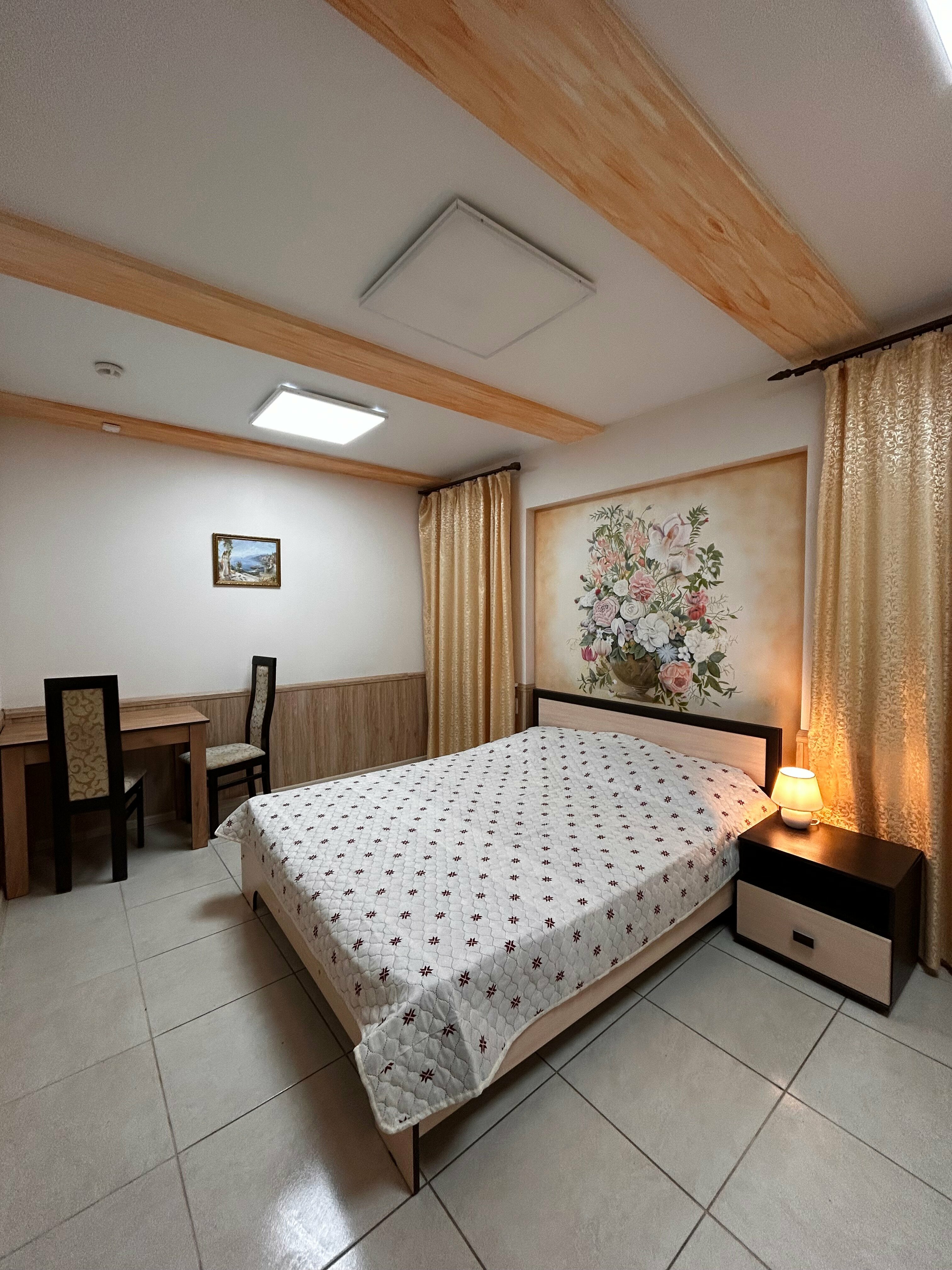 Четырехместный номер с общей ванной комнатой