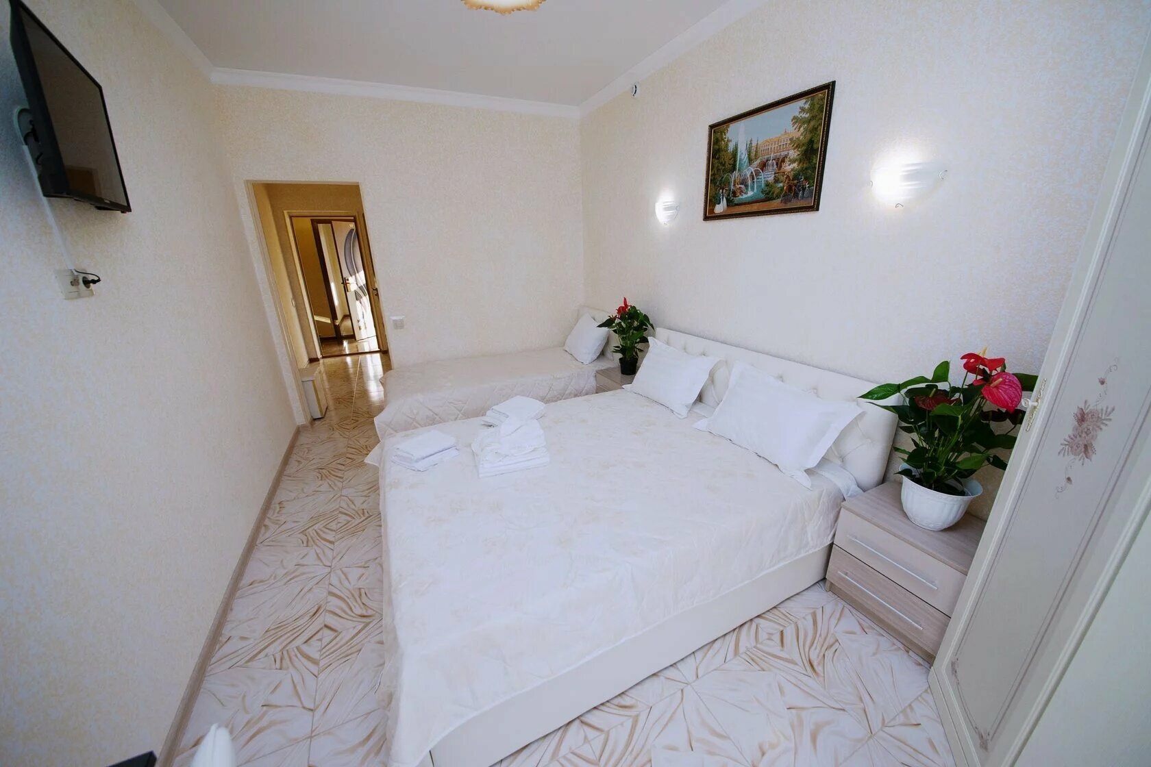 Трехместный номер с балконом