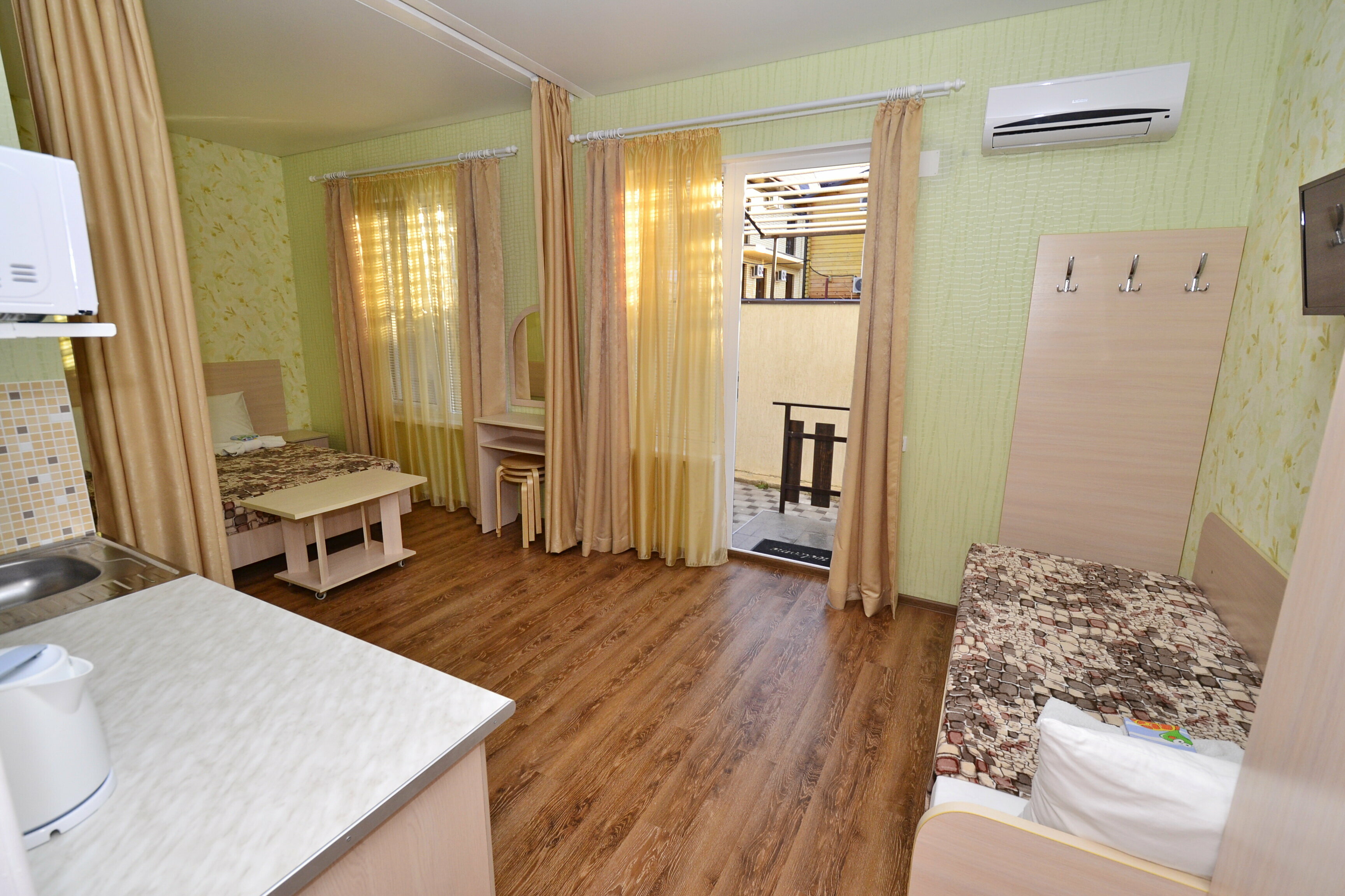 Трехместный номер Делюкс