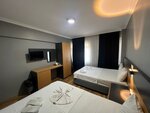 Четырехместный номер «Делюкс» в Hotel Otag