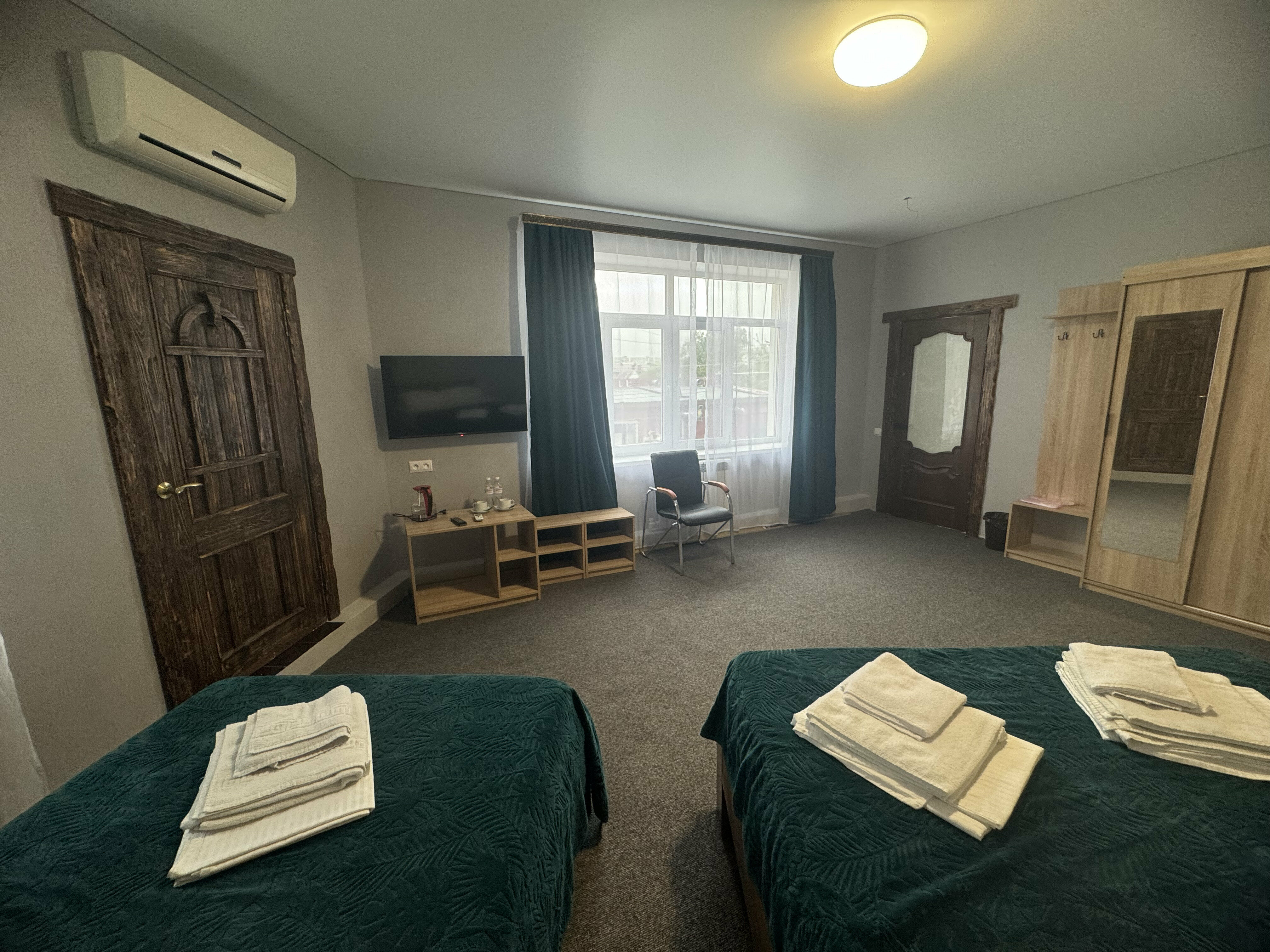 Трехместный номер с балконом