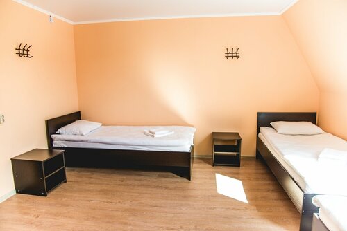 Двухместный номер с 2 отдельными кроватями и общей ванной комнатой