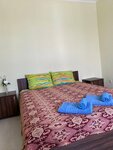 Двухместный номер с двуспальной кроватью и дополнительной кроватью в Бархат