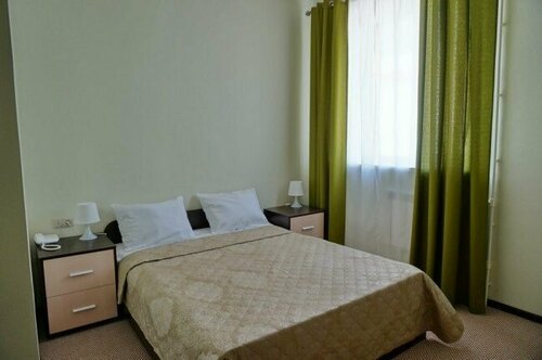 Номер стандарт с 1 двуспальной кроватью