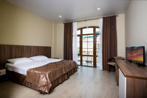 Стандартный двухместный номер с 1 кроватью или 2 отдельными кроватями и балконом в Аквариус