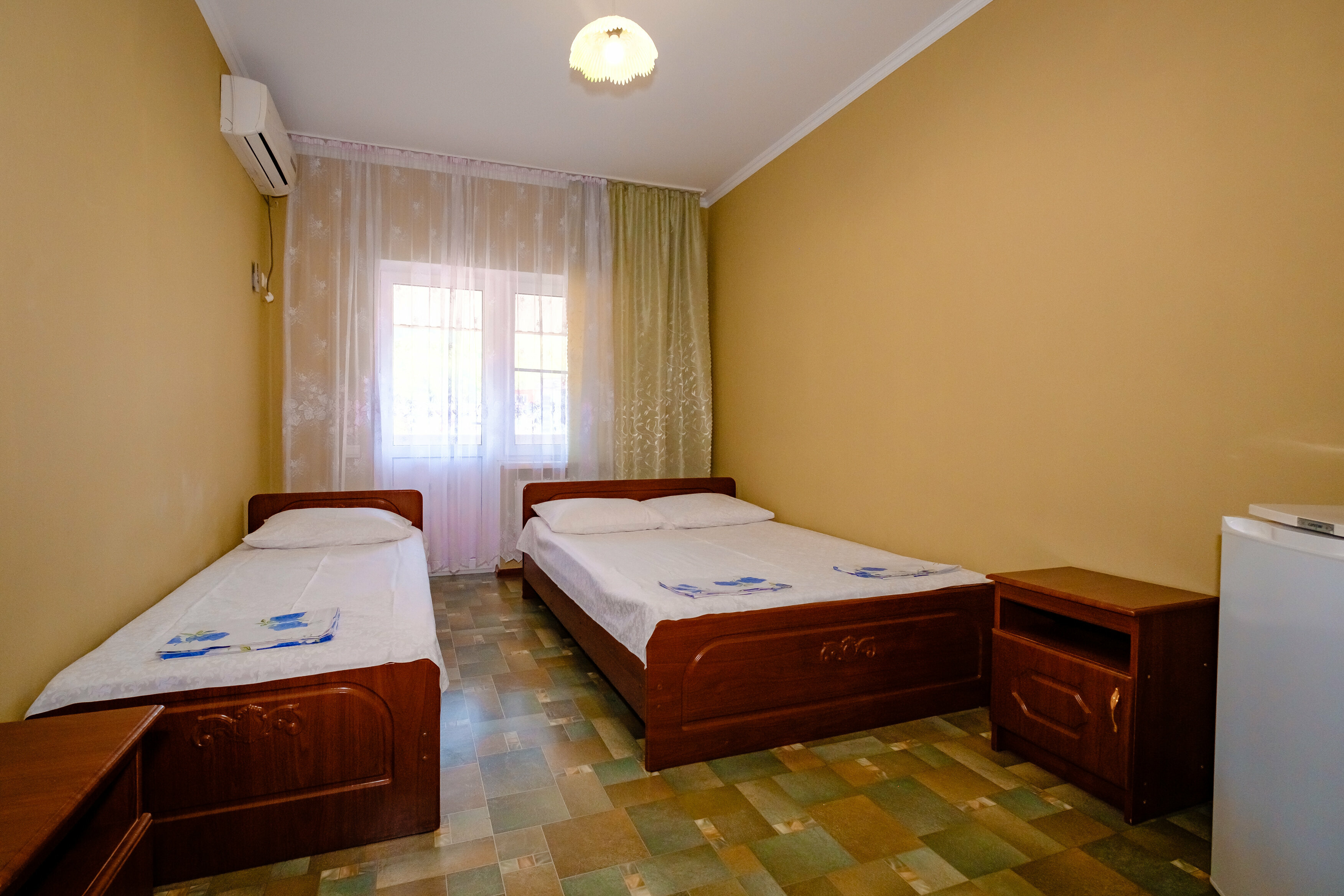 Трехместный номер с балконом