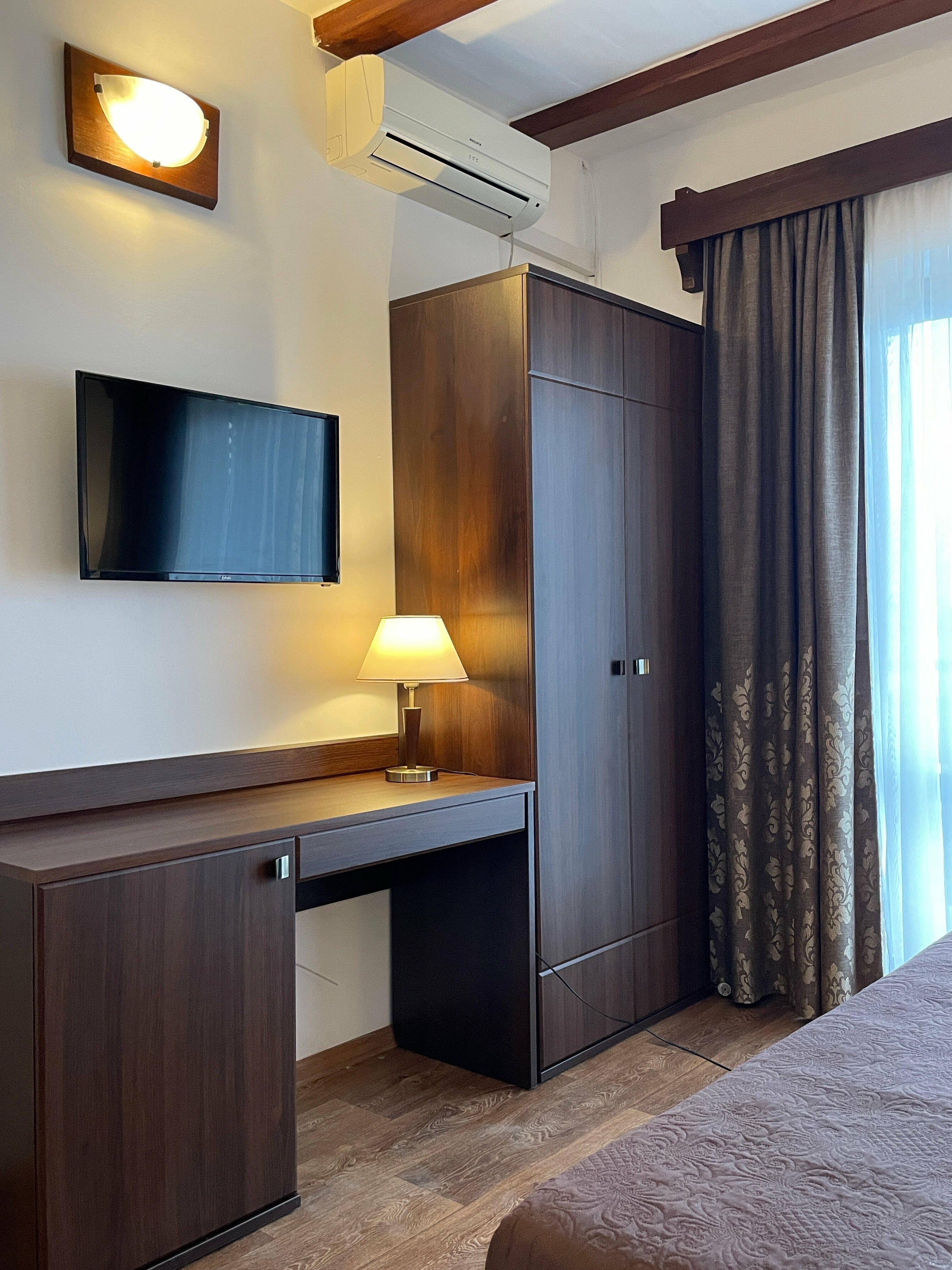 Трехместный номер с балконом