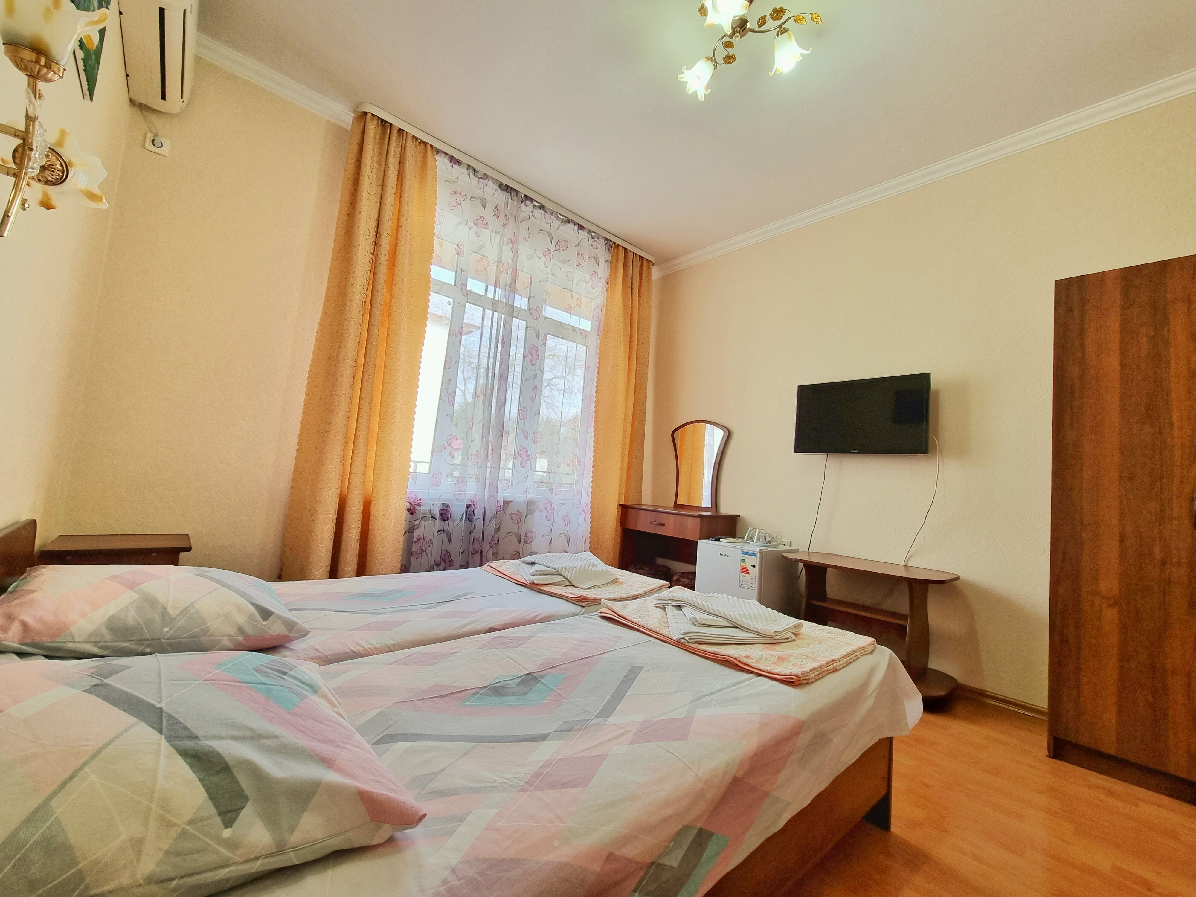 Двухместный номер с 2 отдельными кроватями и балконом