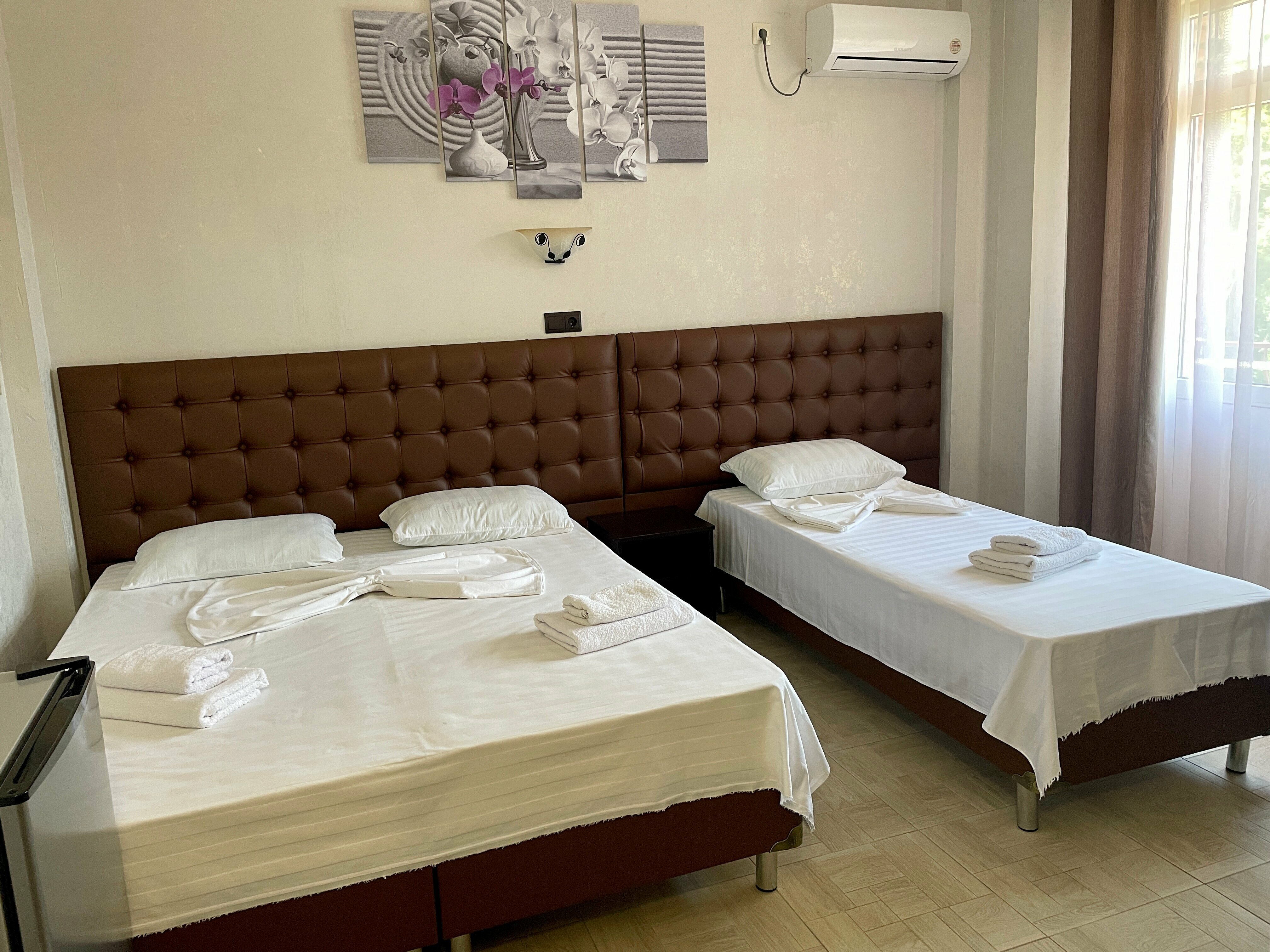 Трехместный номер Делюкс