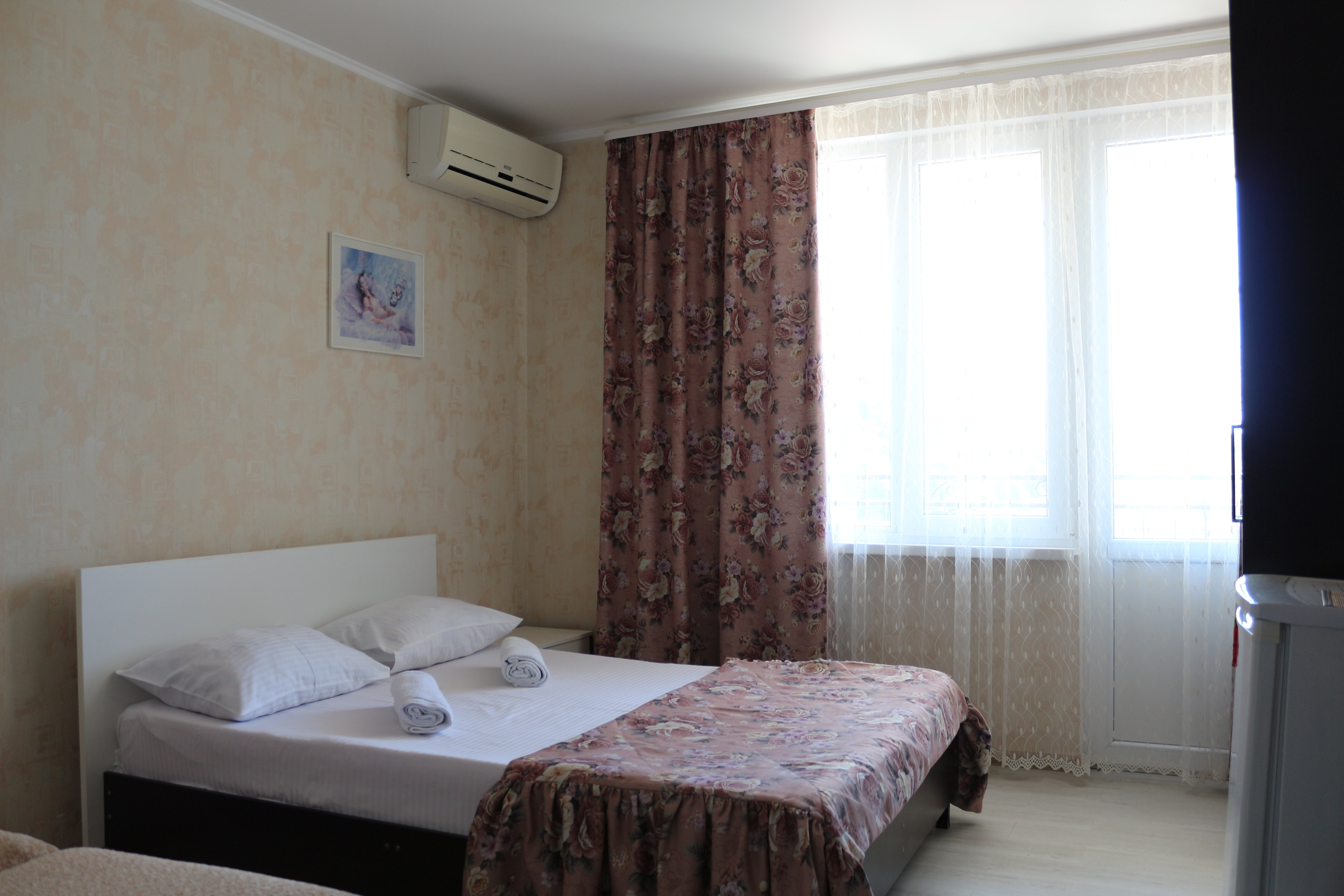 Трехместный номер с балконом