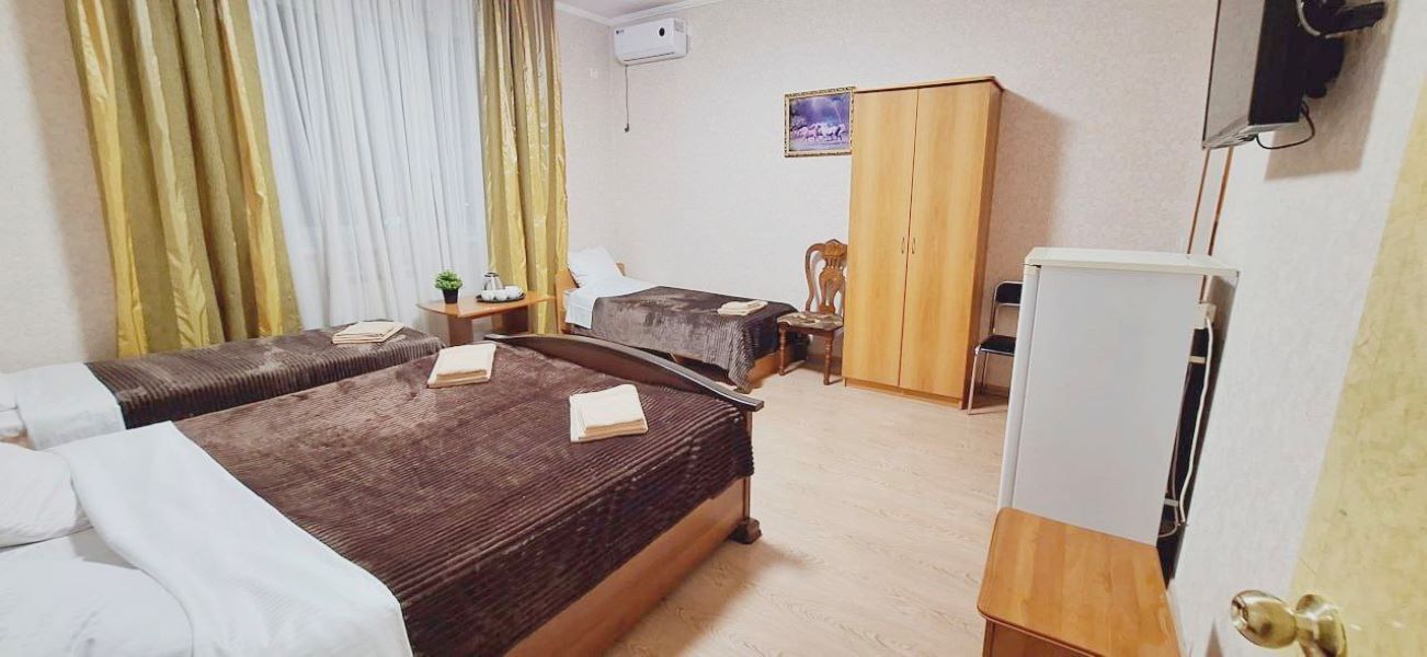 Улучшенный четырехместный номер