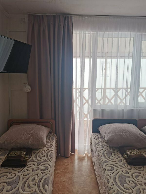 Улучшенный трехместный номер с видом на море