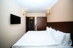 Семейный люкс, вид на город в Hotel Corner Inn