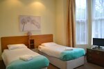 Номер с 2 односпальными кроватями в Hotel 65