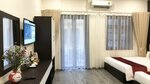 Семейный люкс, балкон, вид на город в Hanoi Elpis Hotel