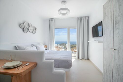 Люкс для новобрачных, вид на море в Sea & Stone Residence Mykonos